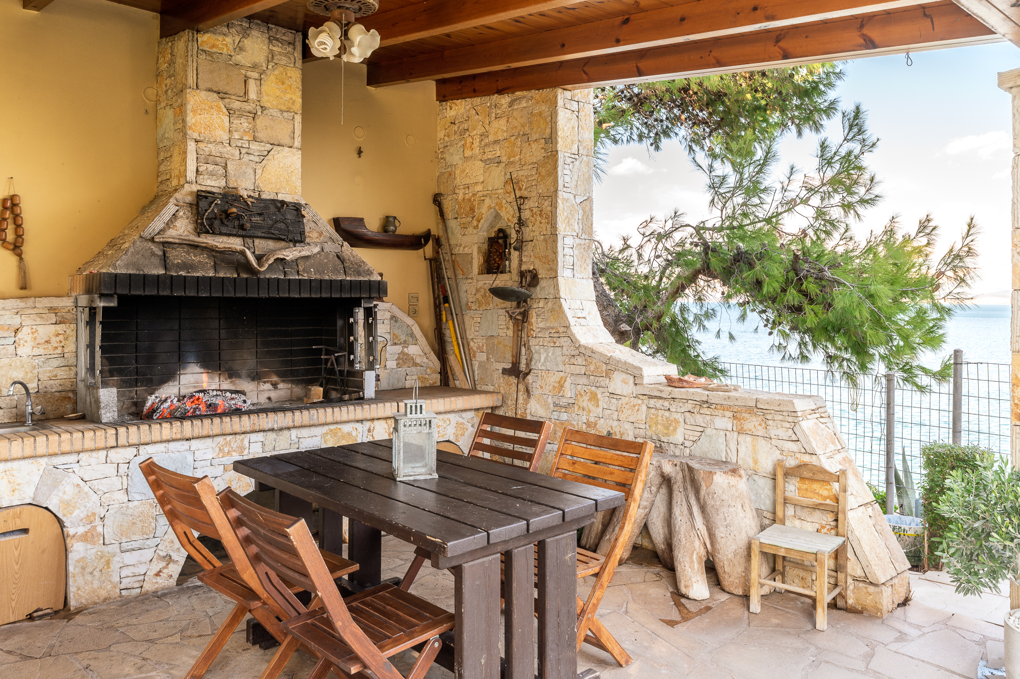 Outdoor BBQ area at Crystal Beach Villa, perfect for grilling and enjoying meals with friends.