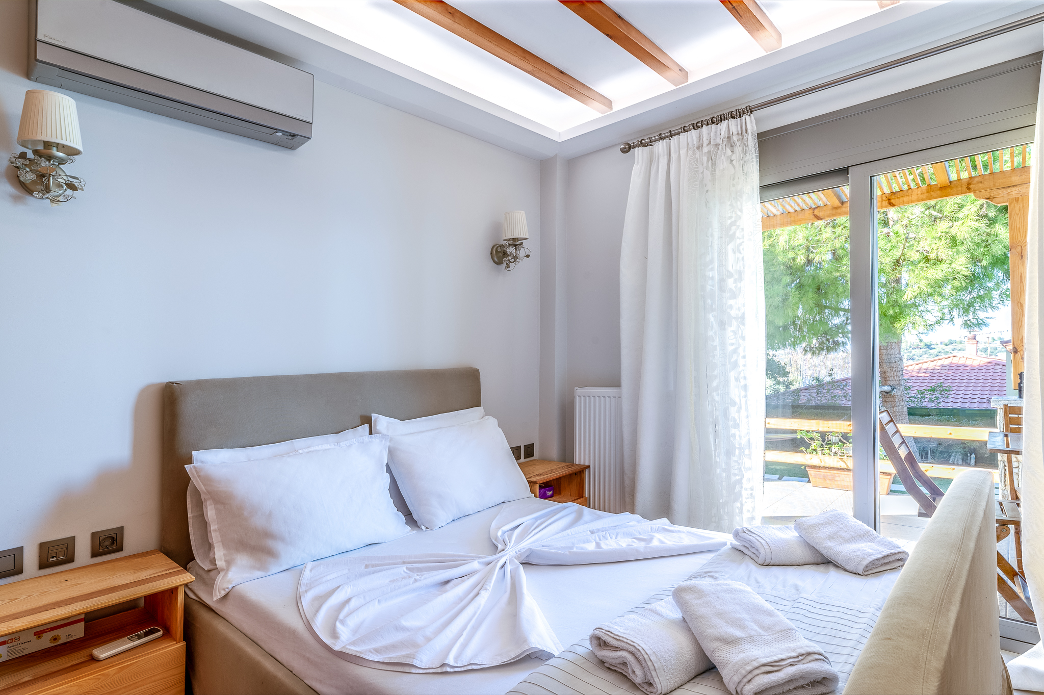 Elegant bedroom in Crystal Beach Villa with a king-size bed and luxurious decor.