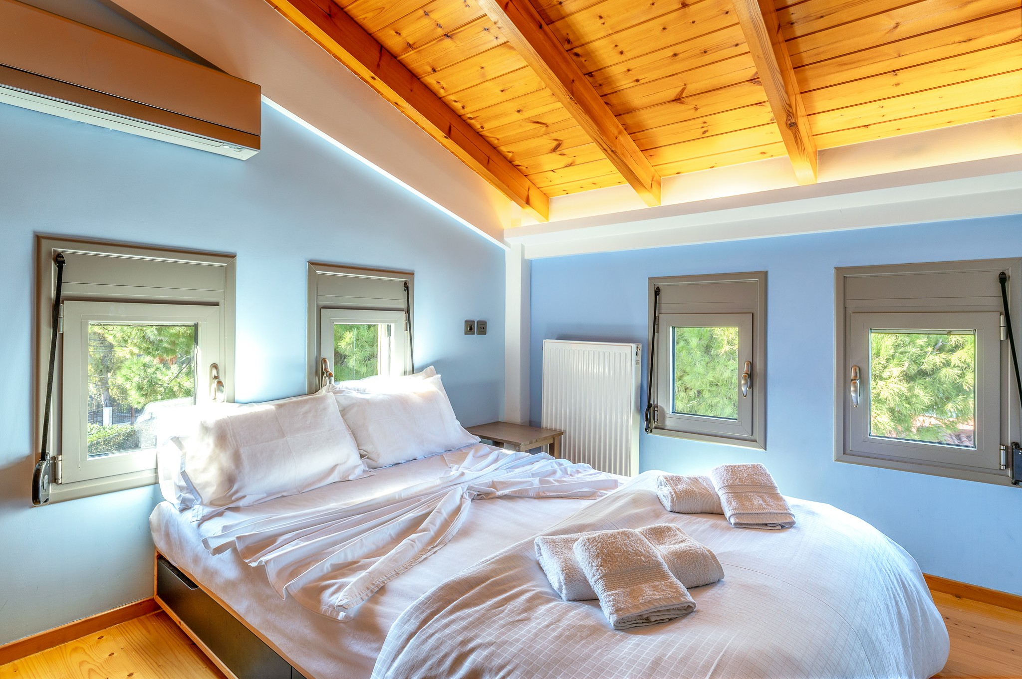 Comfortable bedroom in Crystal Beach Villa with soft bedding and stylish interior design.