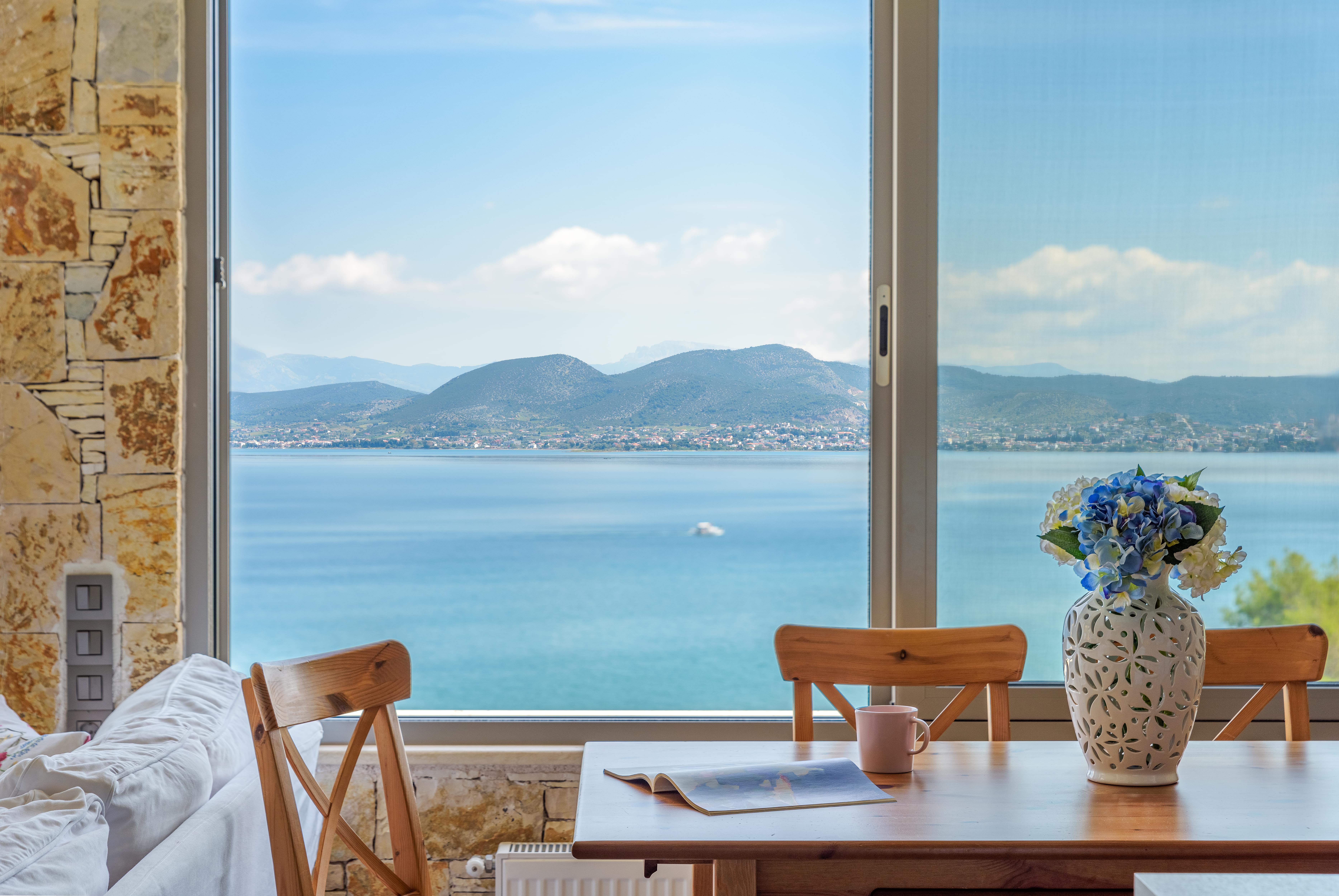 Breathtaking view from the living room window overlooking the Aegean Sea.