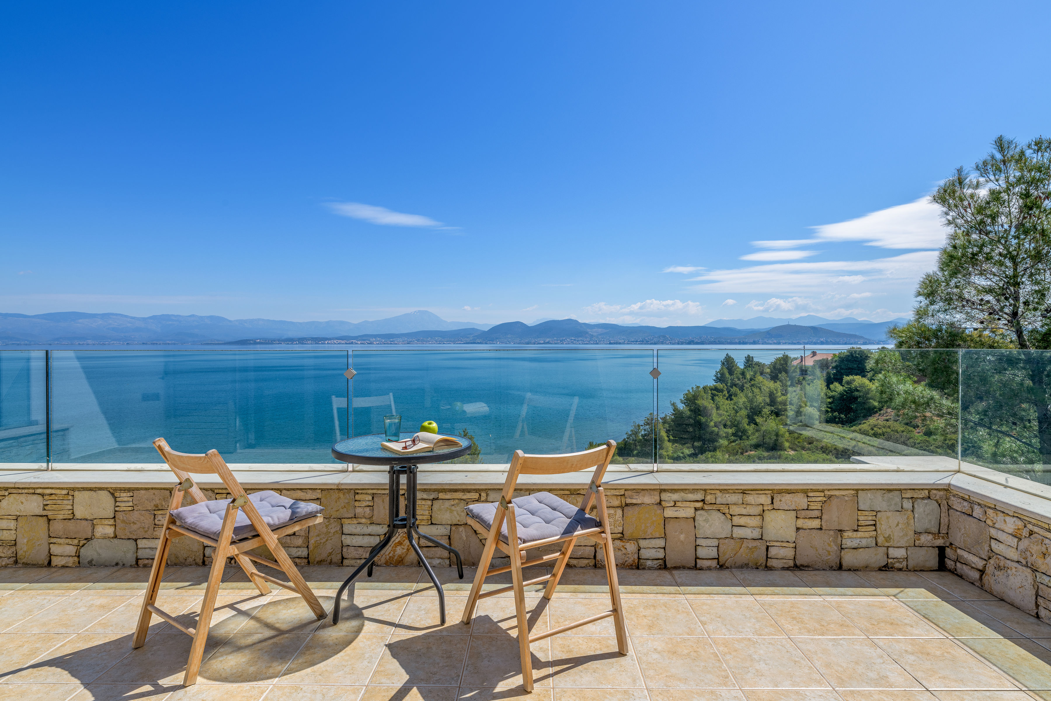 Ocean view from the balcony of Crystal Beach Villa, perfect for relaxation.